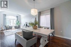 Dining area with Engineered hardwood floors and plenty of natural light - 