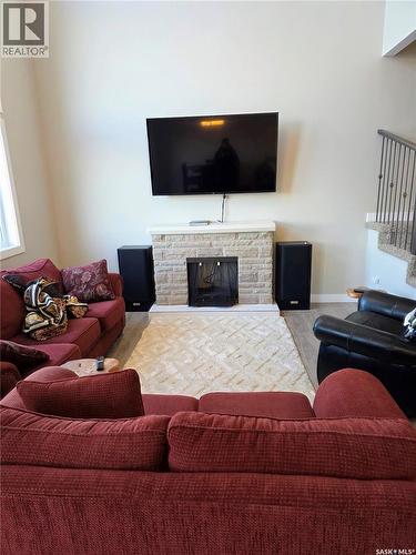 255 Eaton Crescent, Saskatoon, SK - Indoor Photo Showing Living Room With Fireplace