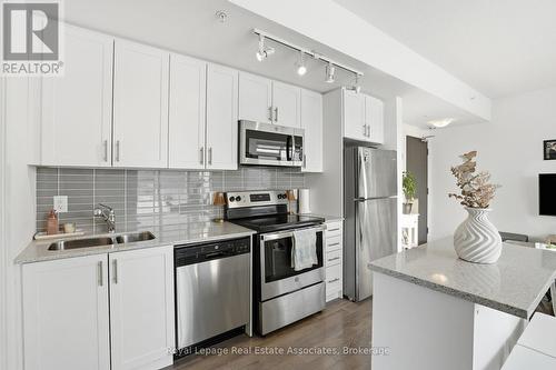 801 - 550 North Service Road, Grimsby, ON - Indoor Photo Showing Kitchen With Double Sink With Upgraded Kitchen