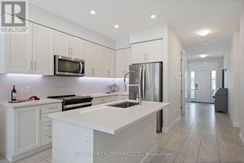 69 Miranda Path, Woolwich, ON - Indoor Photo Showing Kitchen With Stainless Steel Kitchen With Upgraded Kitchen