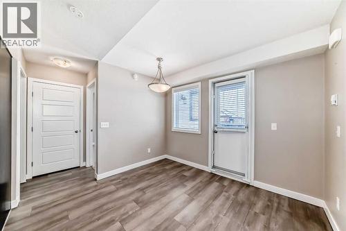 Current Dining Nook - 11302, 2781 Chinook Winds Drive Sw, Airdrie, AB - Indoor Photo Showing Other Room