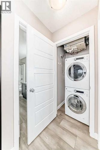 Washer and Dryer - 11302, 2781 Chinook Winds Drive Sw, Airdrie, AB - Indoor Photo Showing Laundry Room