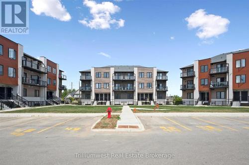 34 - 10 South Creek Drive, Kitchener, ON - Outdoor With Balcony With Facade