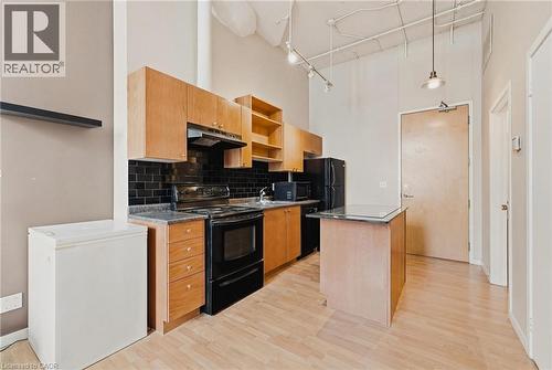 tenants belongings removed to respect tenants privacy - 410 King Street W Unit# 124, Kitchener, ON - Indoor Photo Showing Kitchen