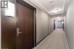 Corridor with a textured wall and baseboards - 