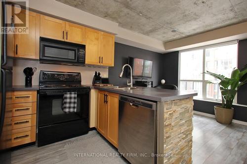 Kitchen - 408 - 800 King Street W, Toronto, ON - Indoor Photo Showing Kitchen With Double Sink