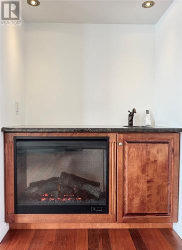 3 Shaws Lane, Deer Lake, NL - Indoor Photo Showing Other Room With Fireplace