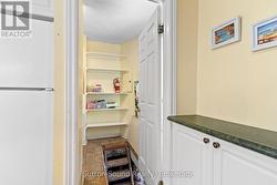 Laundry room with basement access - 