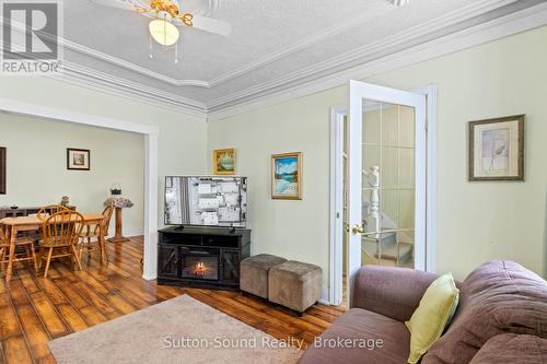 Living room - open to dining area - 269 6Th Street E, Owen Sound, ON - Indoor Photo Showing Living Room With Fireplace
