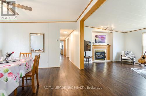 254 - 3033 Townline Road, Fort Erie (Black Creek), ON - Indoor Photo Showing Other Room With Fireplace