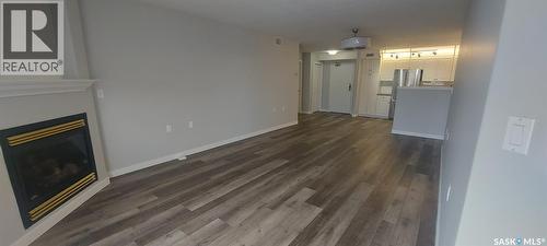 313 325 Keevil Crescent, Saskatoon, SK - Indoor Photo Showing Other Room With Fireplace