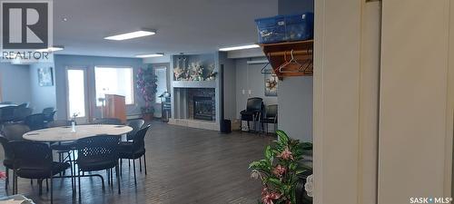 313 325 Keevil Crescent, Saskatoon, SK - Indoor Photo Showing Dining Room With Fireplace