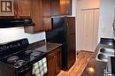 307 2233 St Henry Avenue, Saskatoon, SK  - Indoor Photo Showing Kitchen With Double Sink 