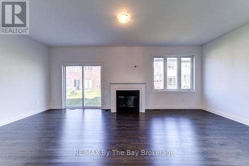 21 Lisa Street, Wasaga Beach, ON - Indoor Photo Showing Living Room With Fireplace
