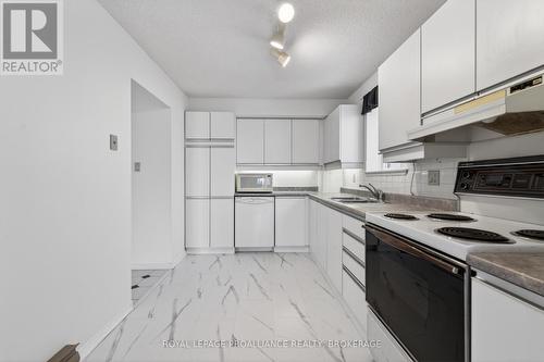 1006 - 257 Bath Road, Kingston (West Of Sir John A. Blvd), ON - Indoor Photo Showing Kitchen With Double Sink