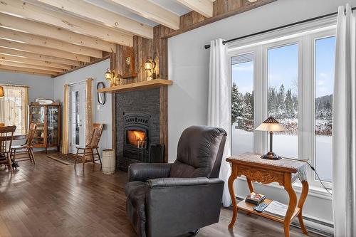 Salon - 221 Ch. Després, La Minerve, QC - Indoor Photo Showing Living Room With Fireplace