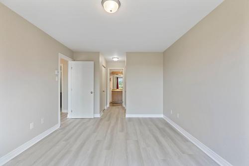 Chambre à coucher principale - 405-5220 Boul. Des Sources, Montréal (Pierrefonds-Roxboro), QC - Indoor Photo Showing Other Room