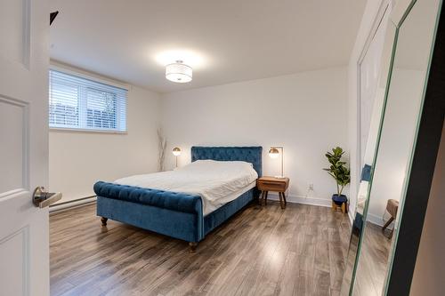 Chambre à coucher principale - 33A Av. Sauriol, Laval (Laval-Des-Rapides), QC - Indoor Photo Showing Bedroom
