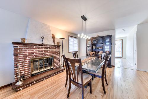 Salle à manger - 3246  - 3250 Boul. Notre-Dame, Laval (Chomedey), QC - Indoor Photo Showing Dining Room With Fireplace