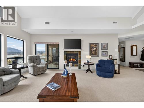 571 6 Street Ne Unit# 302, Salmon Arm, BC - Indoor Photo Showing Living Room With Fireplace