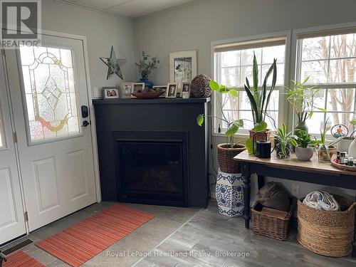 24 Rowan Rd - 77307 Bluewater Highway, Bluewater (Bayfield), ON - Indoor Photo Showing Living Room With Fireplace