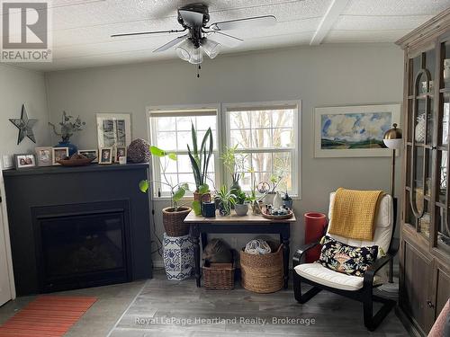 24 Rowan Rd - 77307 Bluewater Highway, Bluewater (Bayfield), ON - Indoor Photo Showing Living Room With Fireplace
