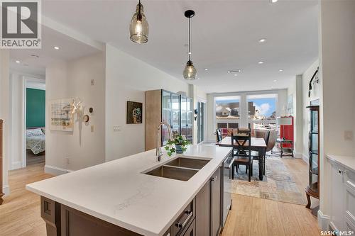 104 408 Cartwright Street, Saskatoon, SK - Indoor Photo Showing Kitchen With Double Sink With Upgraded Kitchen