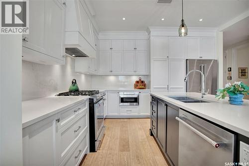 104 408 Cartwright Street, Saskatoon, SK - Indoor Photo Showing Kitchen With Double Sink With Upgraded Kitchen