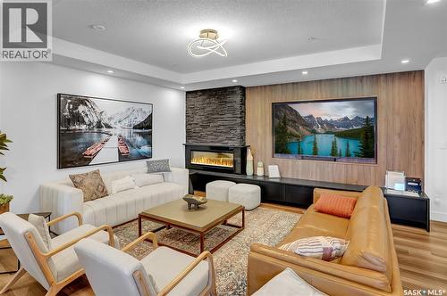 206 3581 Evans Court, Regina, SK - Indoor Photo Showing Living Room With Fireplace