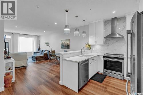 206 3581 Evans Court, Regina, SK - Indoor Photo Showing Kitchen With Upgraded Kitchen