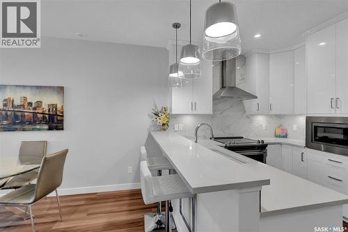 206 3581 Evans Court, Regina, SK - Indoor Photo Showing Kitchen With Double Sink With Upgraded Kitchen