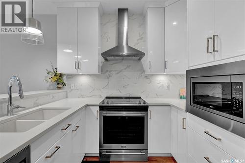 206 3581 Evans Court, Regina, SK - Indoor Photo Showing Kitchen With Double Sink With Upgraded Kitchen