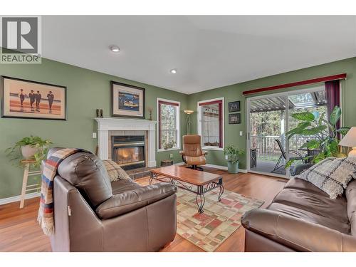 3008 Quail Crescent, Kelowna, BC - Indoor Photo Showing Living Room With Fireplace