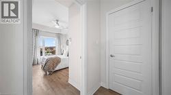 Bedroom with wood finished floors and ceiling fan - 