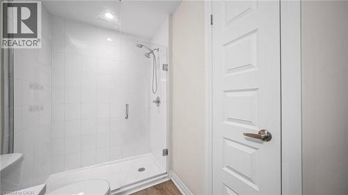 Full bathroom with a shower stall and toilet - 610 Farmstead Drive Unit# 304, Milton, ON - Indoor Photo Showing Bathroom