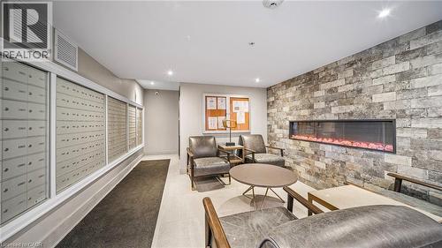 Lobby with recessed lighting - 610 Farmstead Drive Unit# 304, Milton, ON - Indoor With Fireplace
