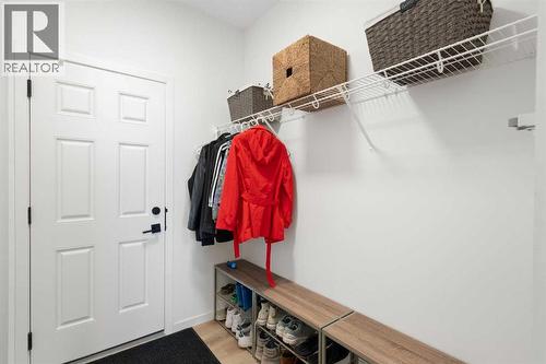 36 Magnolia Bay Se, Calgary, AB - Indoor With Storage