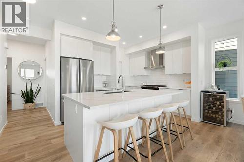 36 Magnolia Bay Se, Calgary, AB - Indoor Photo Showing Kitchen With Upgraded Kitchen