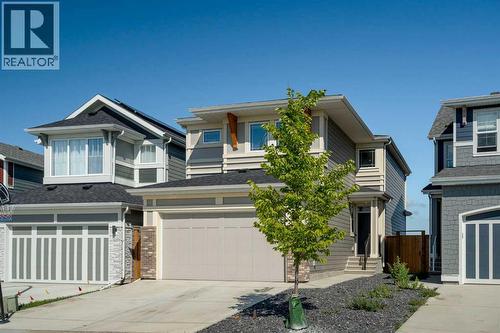 36 Magnolia Bay Se, Calgary, AB - Outdoor With Facade