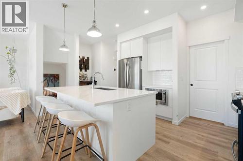 36 Magnolia Bay Se, Calgary, AB - Indoor Photo Showing Kitchen With Upgraded Kitchen