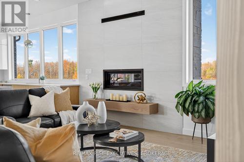 158 Summerside Drive, Frontenac (Frontenac South), ON - Indoor Photo Showing Living Room With Fireplace