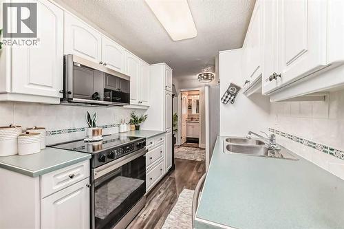 314, 5326 47 Avenue, Red Deer, AB - Indoor Photo Showing Kitchen With Double Sink