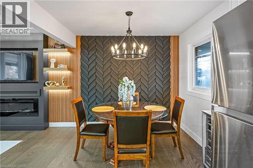 15 Andres Street, Virgil, ON - Indoor Photo Showing Dining Room With Fireplace