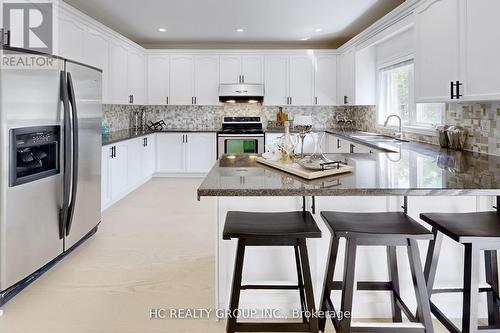 47 Medoc Place, Vaughan, ON - Indoor Photo Showing Kitchen With Upgraded Kitchen