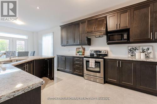 23 Samson Trail, King, ON - Indoor Photo Showing Kitchen With Double Sink