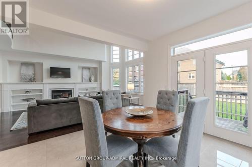 23 Samson Trail, King, ON - Indoor Photo Showing Dining Room With Fireplace