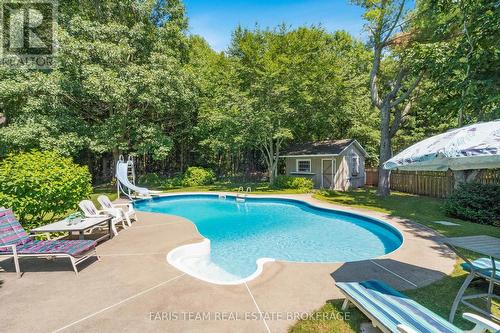 21 Maryjane Road, Tiny, ON - Outdoor With In Ground Pool With Backyard
