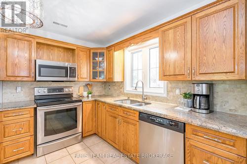 21 Maryjane Road, Tiny, ON - Indoor Photo Showing Kitchen With Double Sink