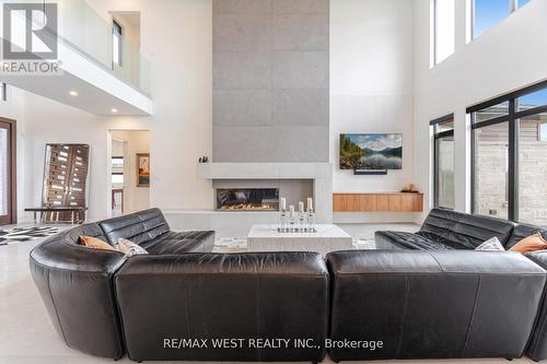 83 Navigation Drive, Prince Edward County, ON - Indoor Photo Showing Living Room With Fireplace