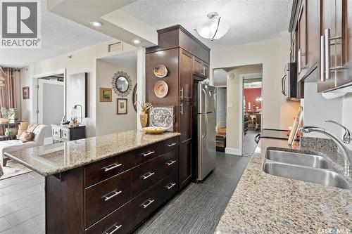 1501 320 5Th Avenue N, Saskatoon, SK - Indoor Photo Showing Kitchen With Double Sink